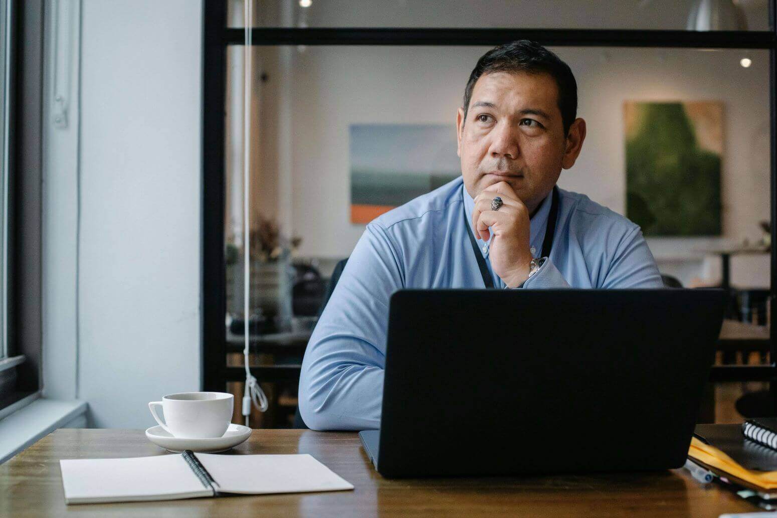 Man thinking with laptop-2
