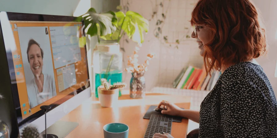 Woman in online meeting from home