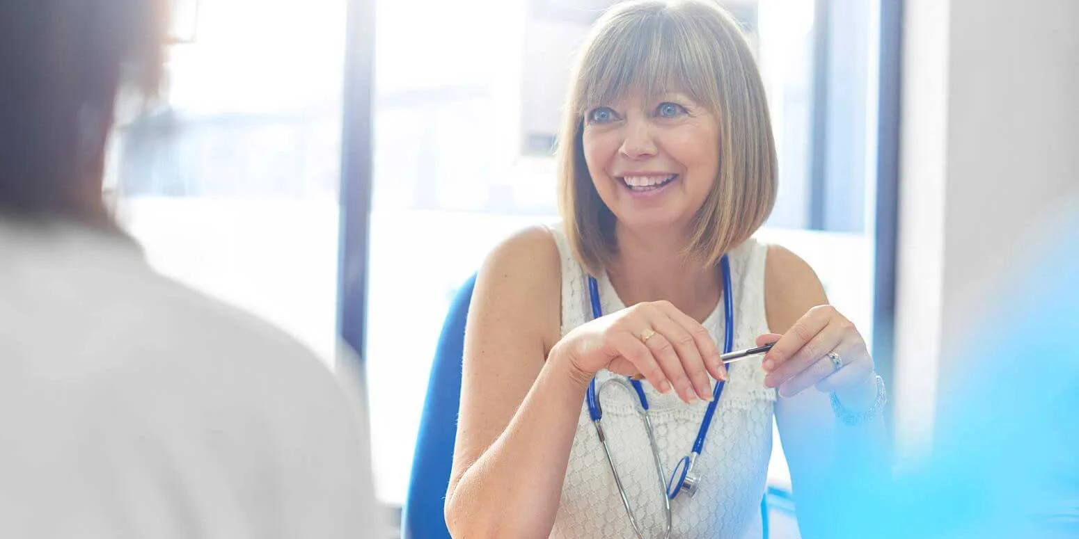 Female GP in consultation